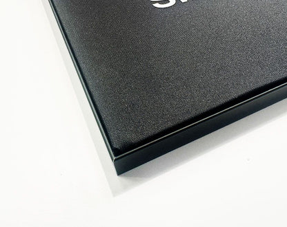 Close up of silicon edged SEG graphic nicely positioned in a black tension frame